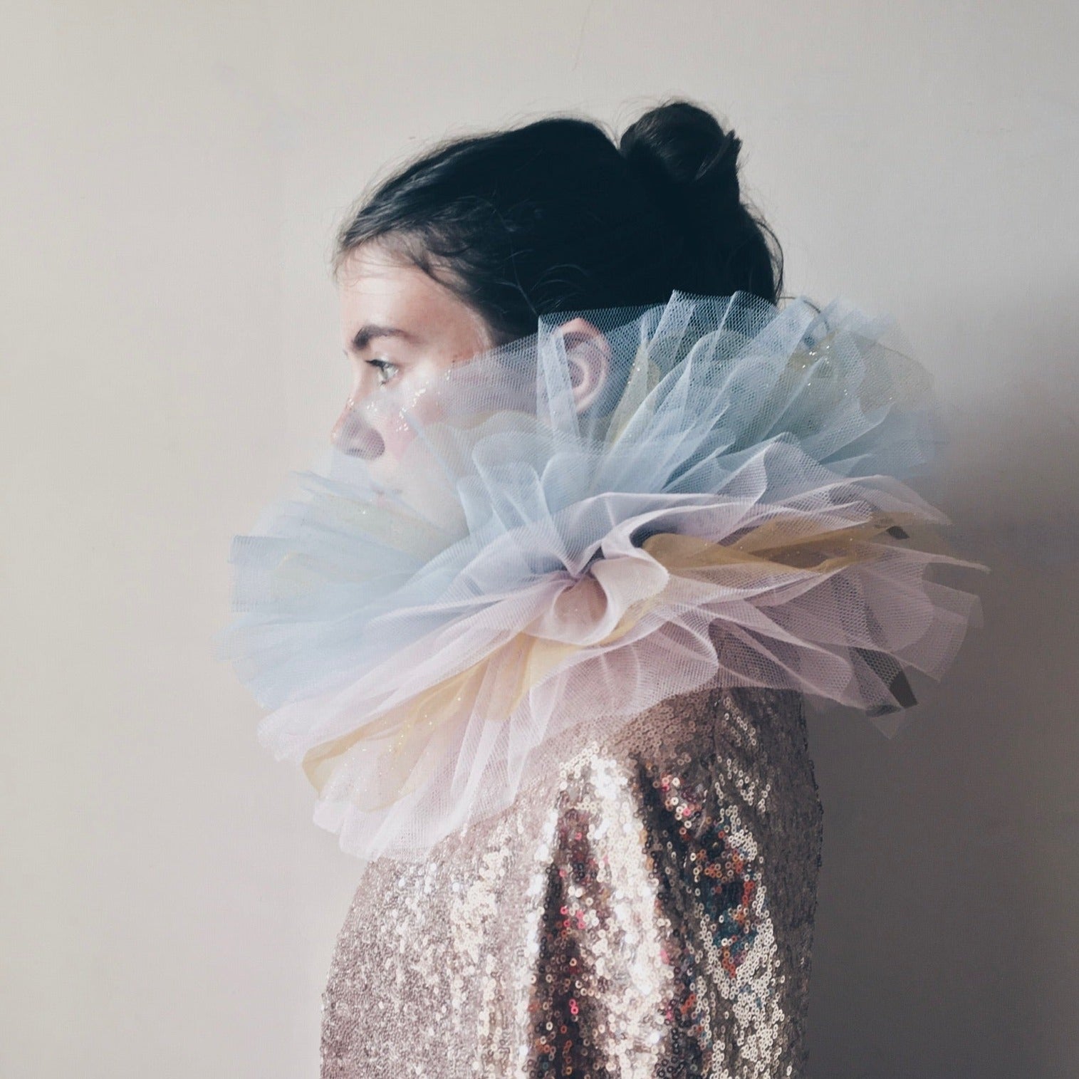 Side view of girl wearing a tulle clown collar and sequin circus cape by For Just ONE Day