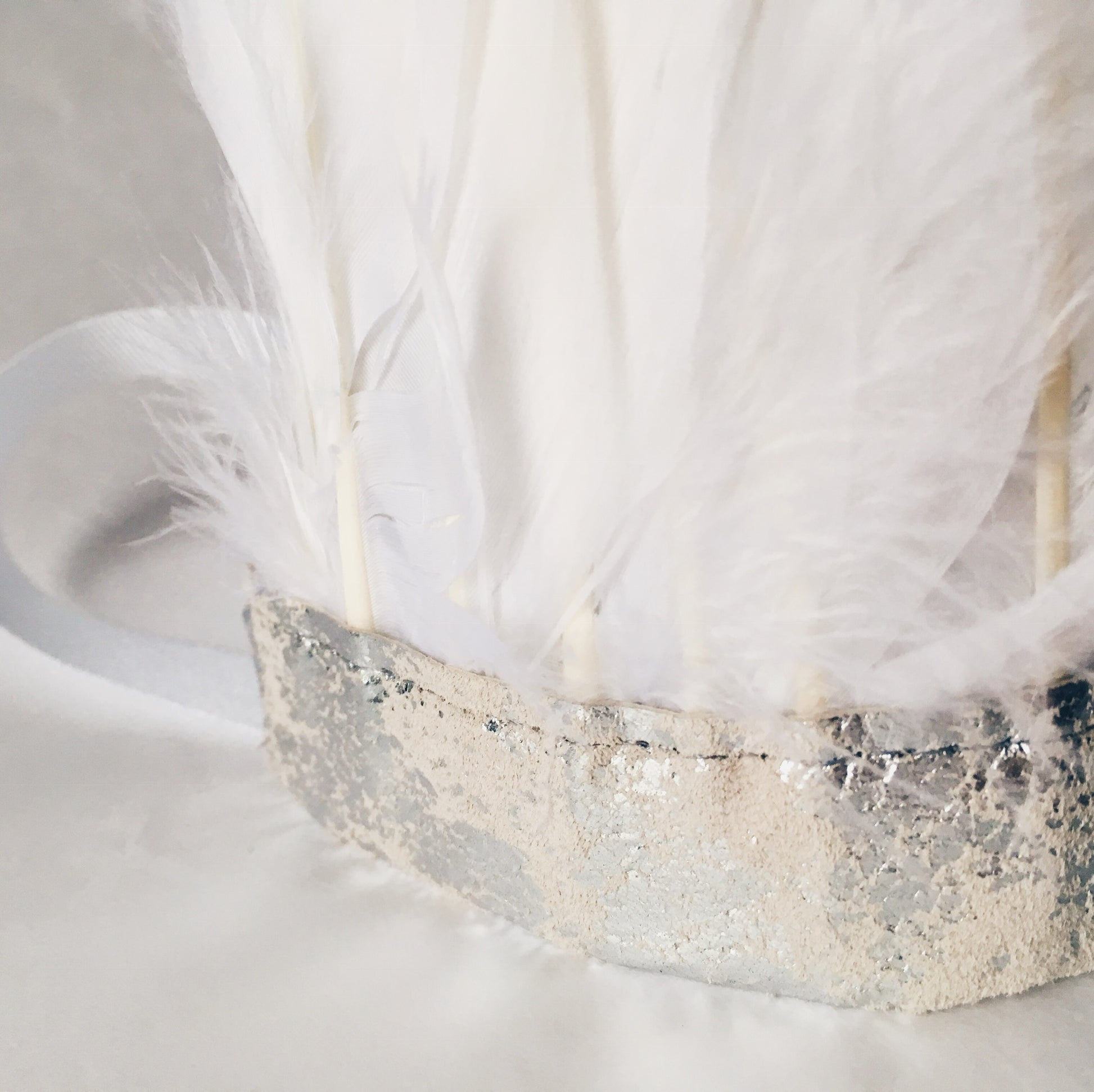 white feather and silver metallic leather headdress by For Just ONE Day