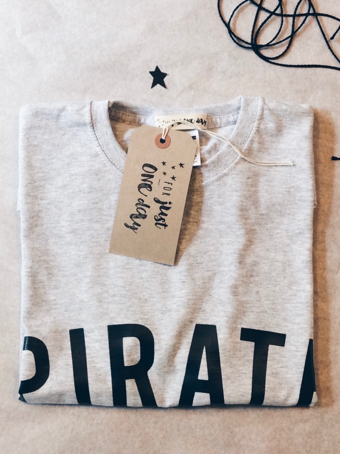 folded grey marl pirate t-shirt by For Just ONE Day