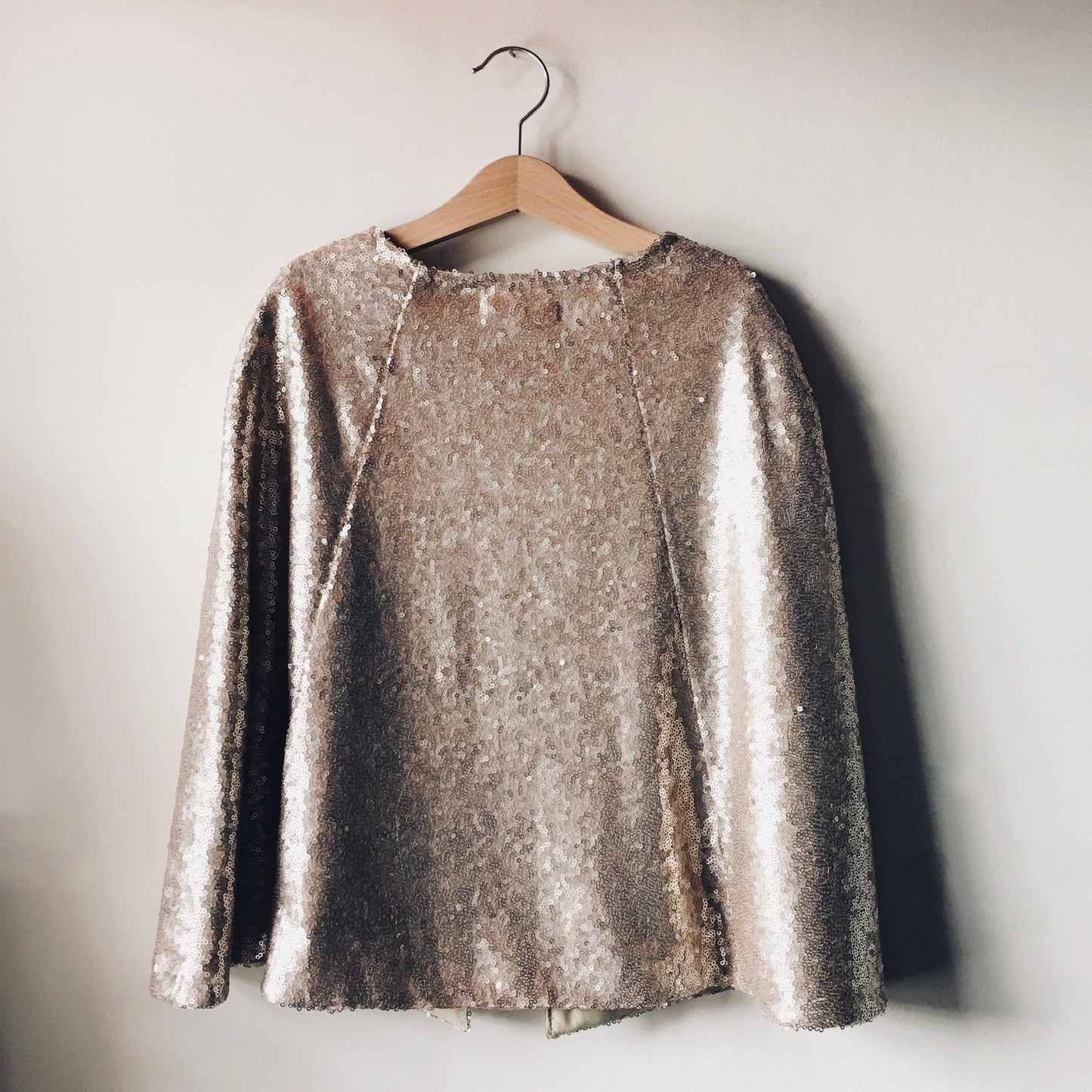 back view of Gold sequin cape by For Just ONE Day