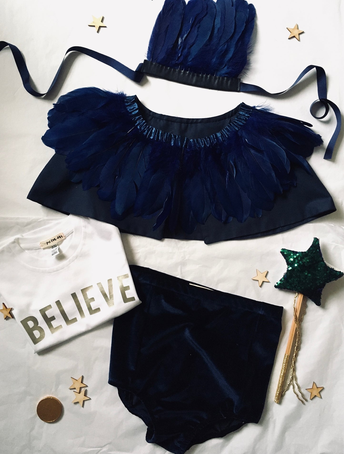 Childs costume - blue feather cape, feather headdress, blue velvet shorts, sequin star wand and a believe t-shirt