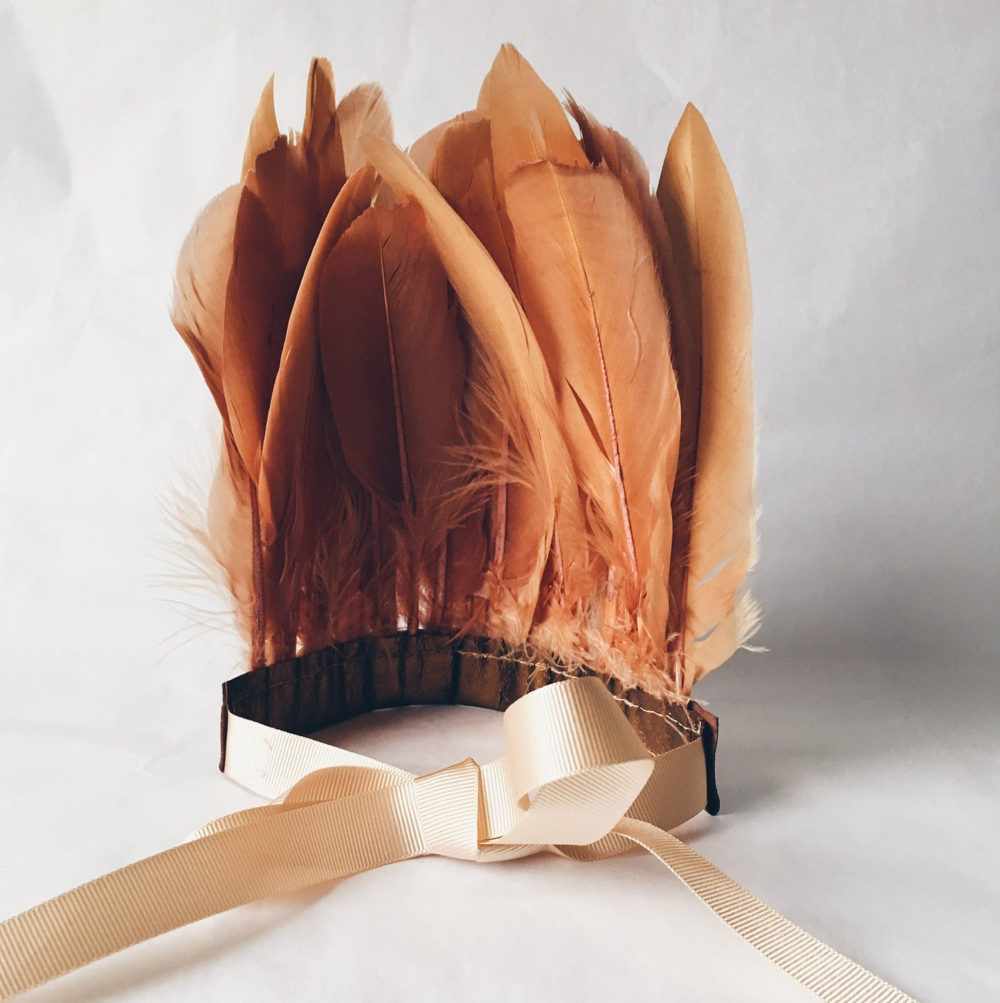 back view of Copper tan feather headdress by For Just ONE Day