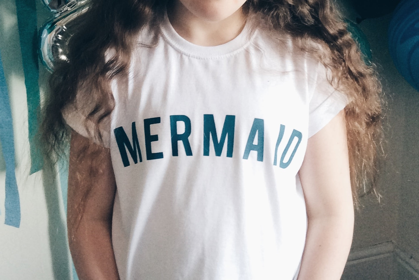 Child wearing mermaid t-shirt by For Just ONE Day