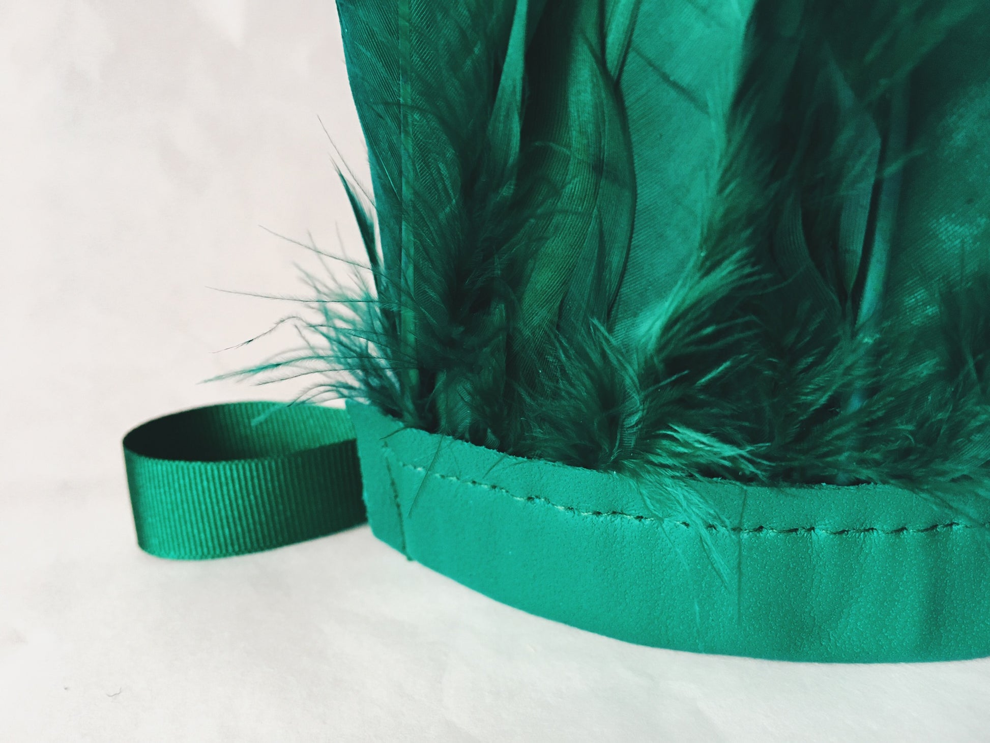 close up of Emerald green feather headdress by For Just ONE Day